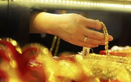 Chênh lệch giá vàng gây áp lực lên tỉ giá
