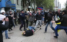 EU tăng cường cấm vận Nga, miền đông Ukraine vẫn nóng
