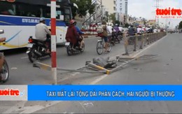 Clip Taxi mất lái tông dải phân cách, hai người trọng thương