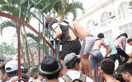 Khách leo rào, nhân viên không dám kéo xuống