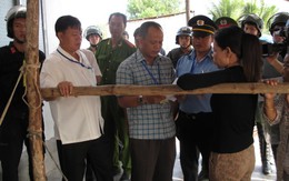 Dùng xăng cố thủ, phản ứng đoàn cưỡng chế đất lấn chiếm