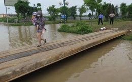 TP.HCM và Hà Nội, bao giờ hết điệp khúc mưa là ngập?
