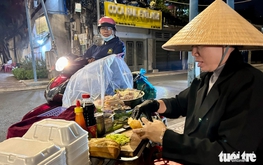 Life goes on as rare cold grips Ho Chi Minh City