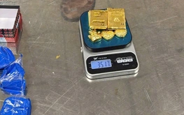 Passengers held at Hanoi airport with 12.3kg of suspected gold hidden in underwear