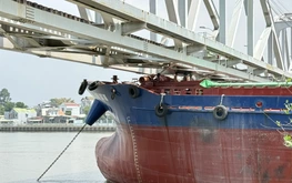 Train services halted as barge collision damages bridge in southern Vietnam