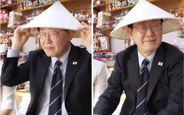 South Korea’s president dons conical hat, samples durian on Hanoi streets