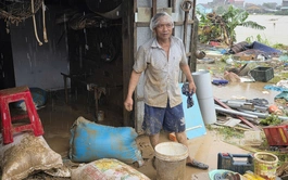 How can central Vietnam reduce flood damage?