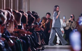 Victoria Beckham shows sheer dresses and sharp suits at Paris Fashion Week