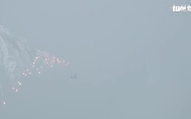 Watch Su-30MK2 jets release flares, helicopters soar over Hanoi in National Day parade