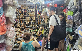 Ho Chi Minh City’s traditional markets are turning to tourism as business slows.