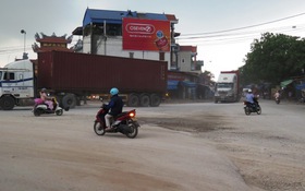 Xe “khủng” né thu phí tràn vào thành phố