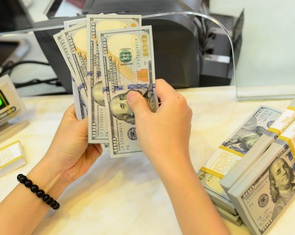 Doanh nghiệp chật vật với giá USD tăng
