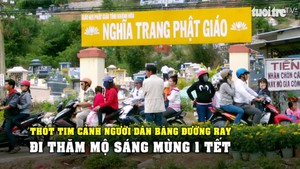 Thót tim cảnh người dân băng đường ray đi thăm mộ sáng mùng 1 Tết