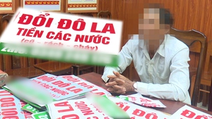 Xử lý nhóm dán biển quảng cáo thu đổi đô la, ngoại tệ trái phép