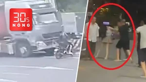 Bản tin 30s Nóng: Xe đầu kéo húc văng xe máy băng ẩu qua quốc lộ; Nhóm gần 10 đàn ông đánh 3 phụ nữ