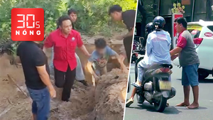 Bản tin 30s nóng: Cứu bé trai bị cát vùi lấp; Tài xế ô tô rút chìa khóa xe máy của cô gái