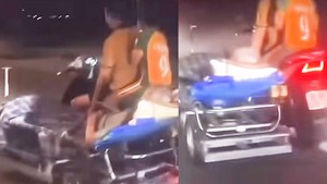 Lái xe máy kéo theo giường chở bệnh nhân 'đi bão', người đàn ông bị phạt 1,7 triệu đồng