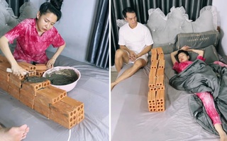 Ảnh vui 17-8: Vợ giận chồng xếp gạch xây tường ngăn đôi chiếc giường
