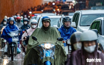 Heavy rain causes severe traffic congestion across western Hanoi