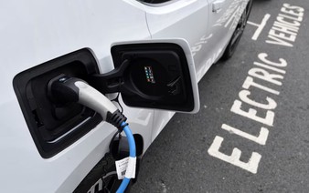 Global EV sales hit record 2.1 million in September, research firm says