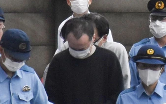 Tokyo police arrest phone scam group leader