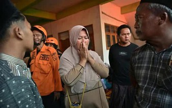 Rescuers search for 59 people trapped under collapsed Indonesian school