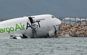Cargo plane slides off runway in Hong Kong, media reports 2 dead