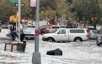 Heavy rains in New York kill 2, disrupt flights