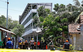 At least 50 bodies recovered after Indonesian school collapse, 13 remain missing