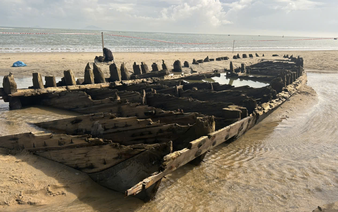 Centuries-old shipwreck exposed on Vietnam beach after storm Kalmaegi