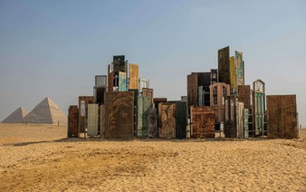 Monumental art displayed in shade of Egypt's pyramids