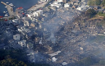 Fire razes 170 buildings in southern Japan, one missing
