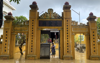 Tourists return to Vietnam's Hoi An as cleanup efforts progress after floods