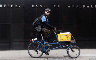 Australia's central bank holds rates at 3.60%, signals caution