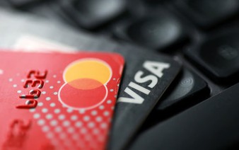 Visa, Mastercard to pay $167.5 million in ATM user fee settlement