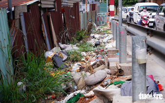 Ho Chi Minh City streets littered with household, construction waste
