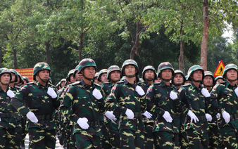 Lao, Cambodian troops rehearse for Vietnam's Reunification Day parade