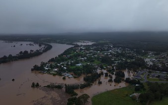 Flash floods cut off inland Australian towns, residents flee to rooftops
