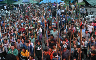 From stronghold guarded by backers, Bolivia ex-leader plots return