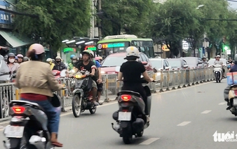 Motorbikes, bicycles driving against traffic a daily routine on Ho Chi Minh City streets