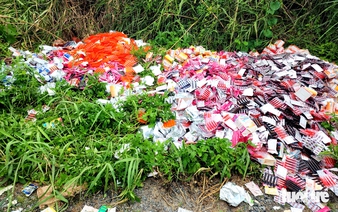 Thousands of dietary supplement boxes dumped on outskirts of Ho Chi Minh City