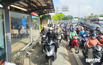 Motorcyclists continue to ride on sidewalks in Ho Chi Minh City despite looming penalties