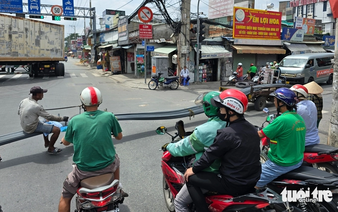 Improvised three-wheeled vehicles still common on Ho Chi Minh City streets