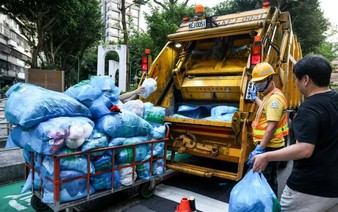 Taiwan's garbage trucks offer classical music and a catch-up
