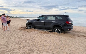 Man fined $190 for driving car onto beach in Vietnam’s Dak Lak