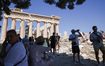 Greece shuts Acropolis for part of day as heat soars, bans outdoor work