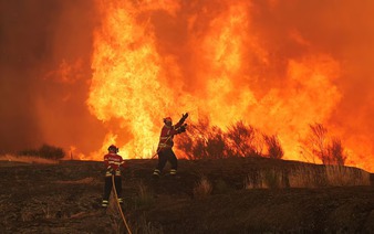 Wildfires fanned by heatwave and strong winds rage across Europe