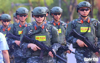 Police officers stage dramatic anti-terror display in Hanoi