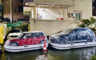 Vietnam car owners turn to flood-protection bags amid storm fears