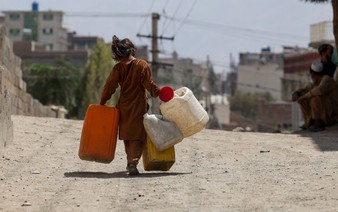 Kabul's wells run dry, driving children out of class and into water queues